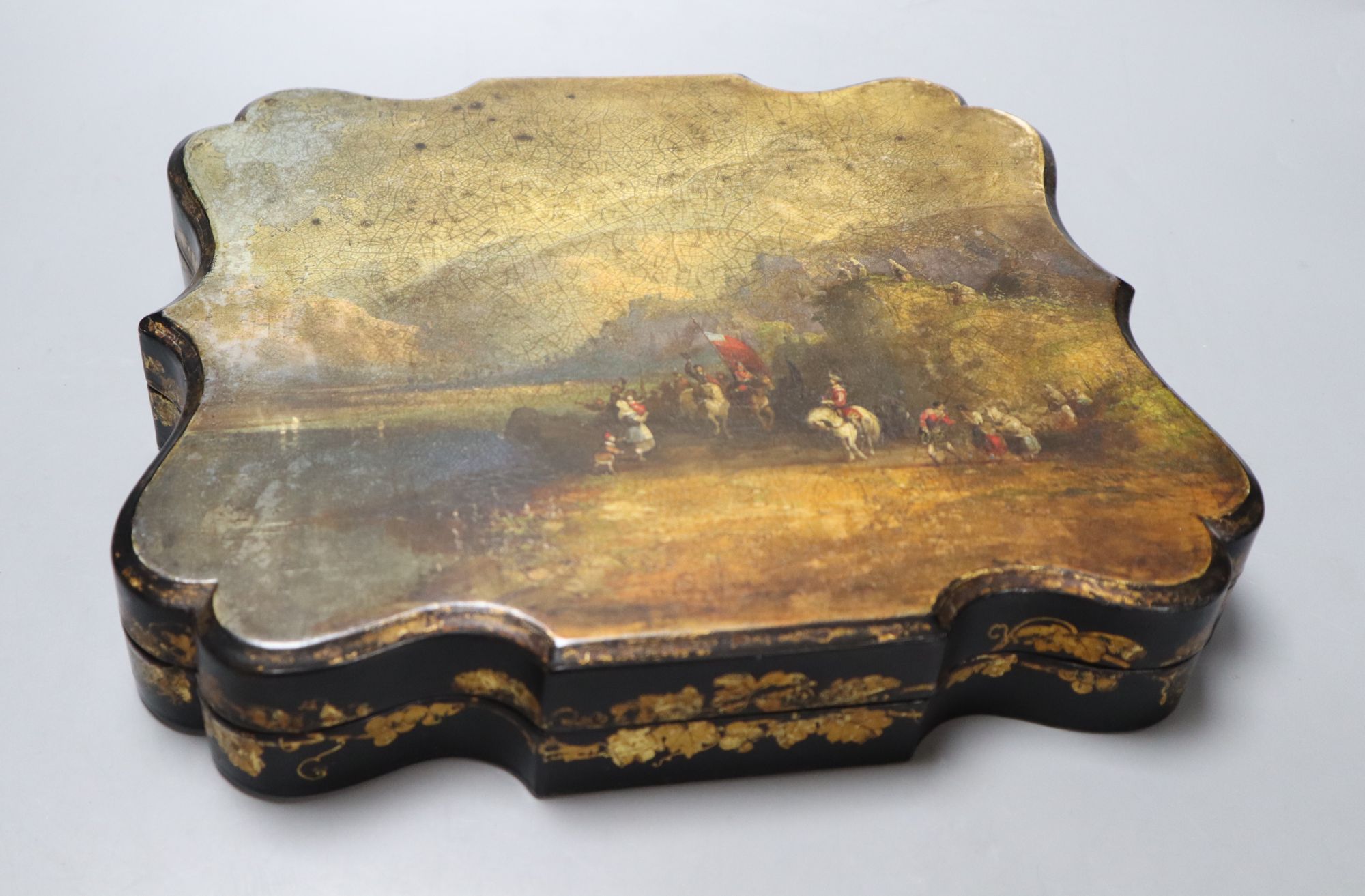 A Jennens and Bettridge papier mache box games box containing a quantity of Chinese mother of pearl counters, length 30cm